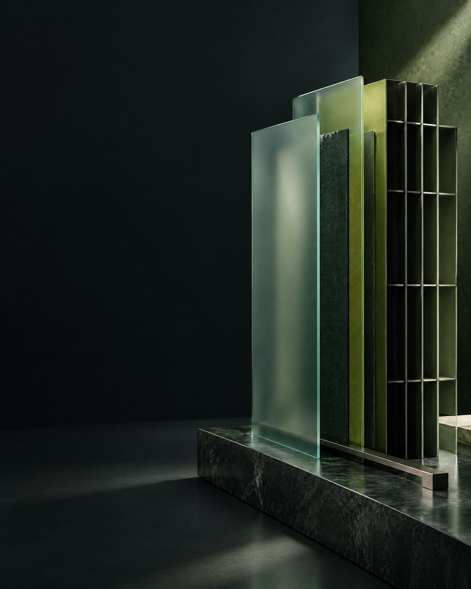 Abstract layered forms and frosted glass in charcoal, forest and lime, arranged beside a clear dark field.