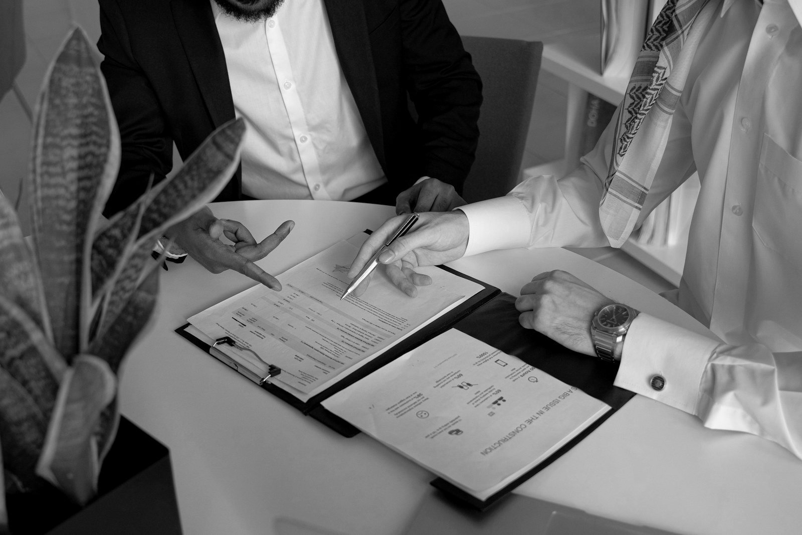 Arbitration clause Bangladesh drafting — lawyers reviewing a commercial contract