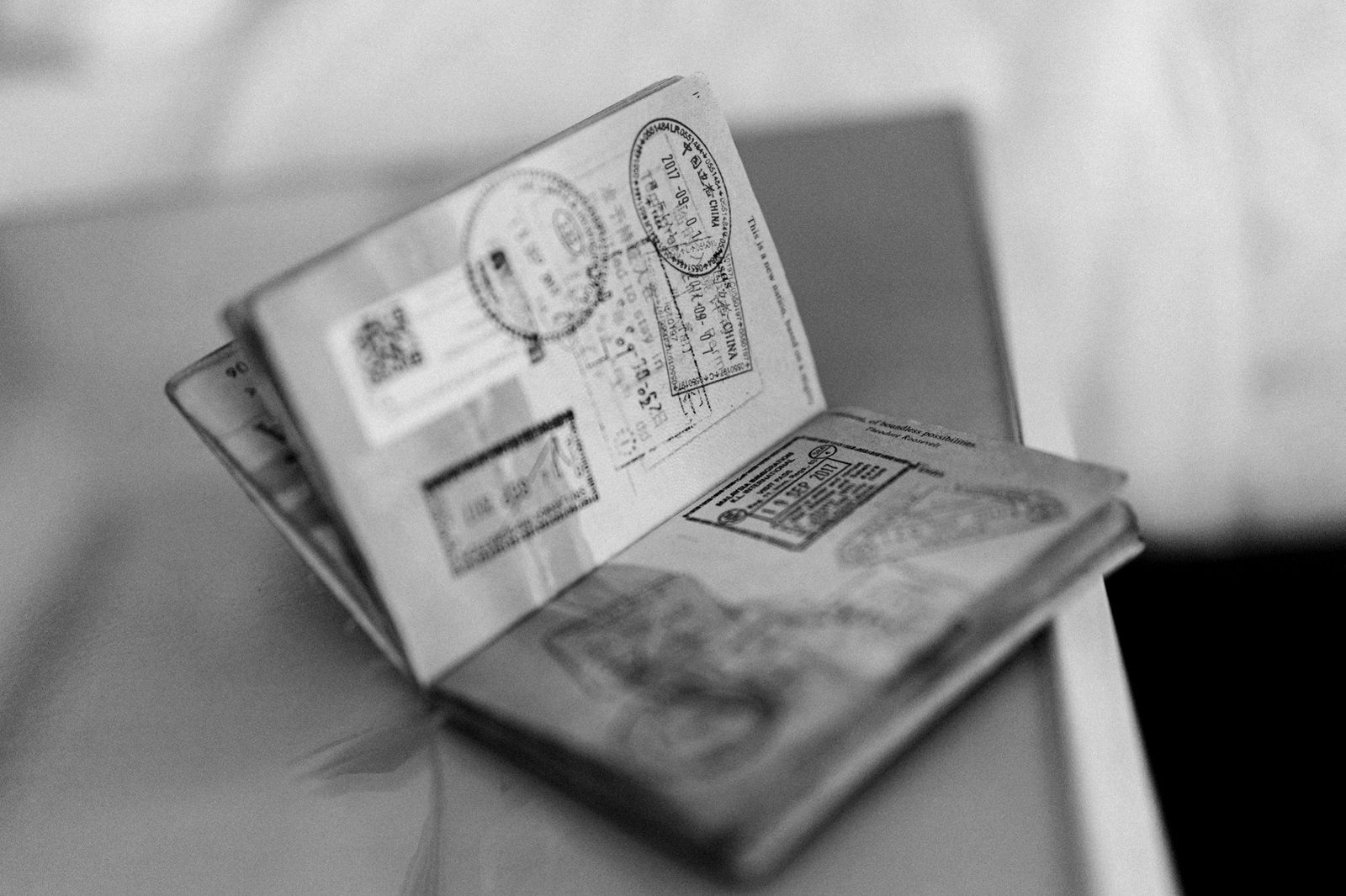 Bangladesh immigration law — traveller presenting a passport at an airport immigration desk