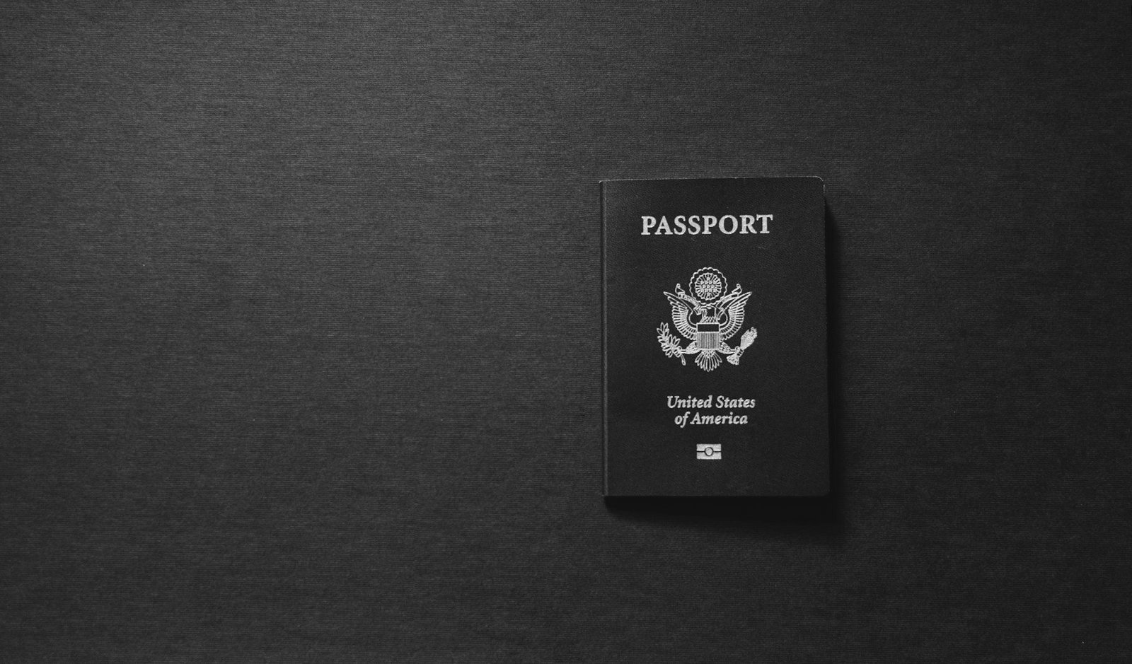 Bangladesh permanent residency — foreign passport and residence documents prepared for an application