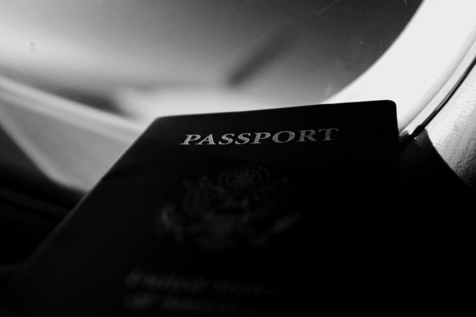 Bangladesh visa fees — traveller holding a passport and banknotes before applying