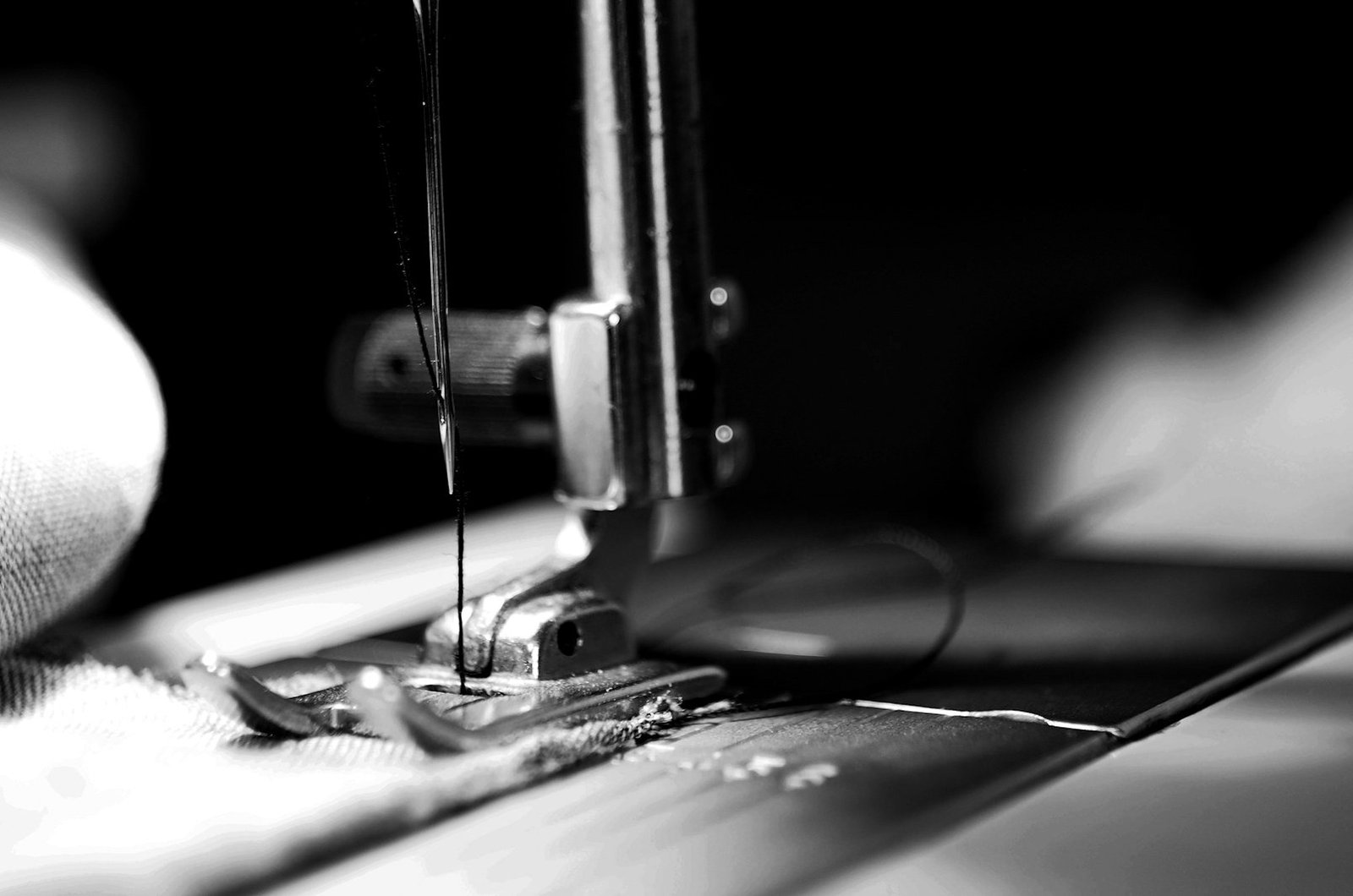 Buying house registration Bangladesh — merchandisers reviewing garment samples in a Dhaka sourcing office