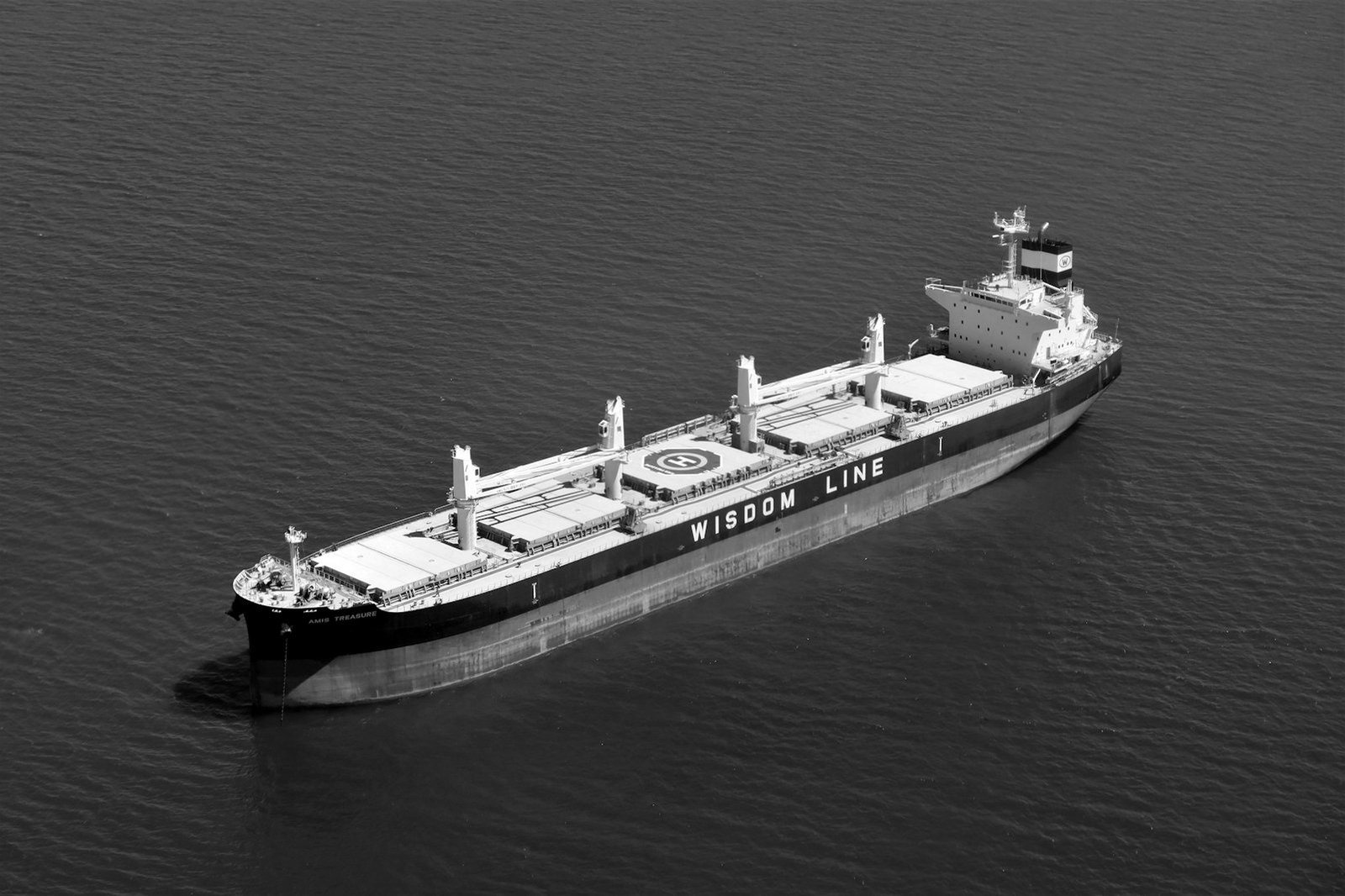 Charterparty disputes in Bangladesh — bulk carrier waiting at an outer anchorage with cargo on board