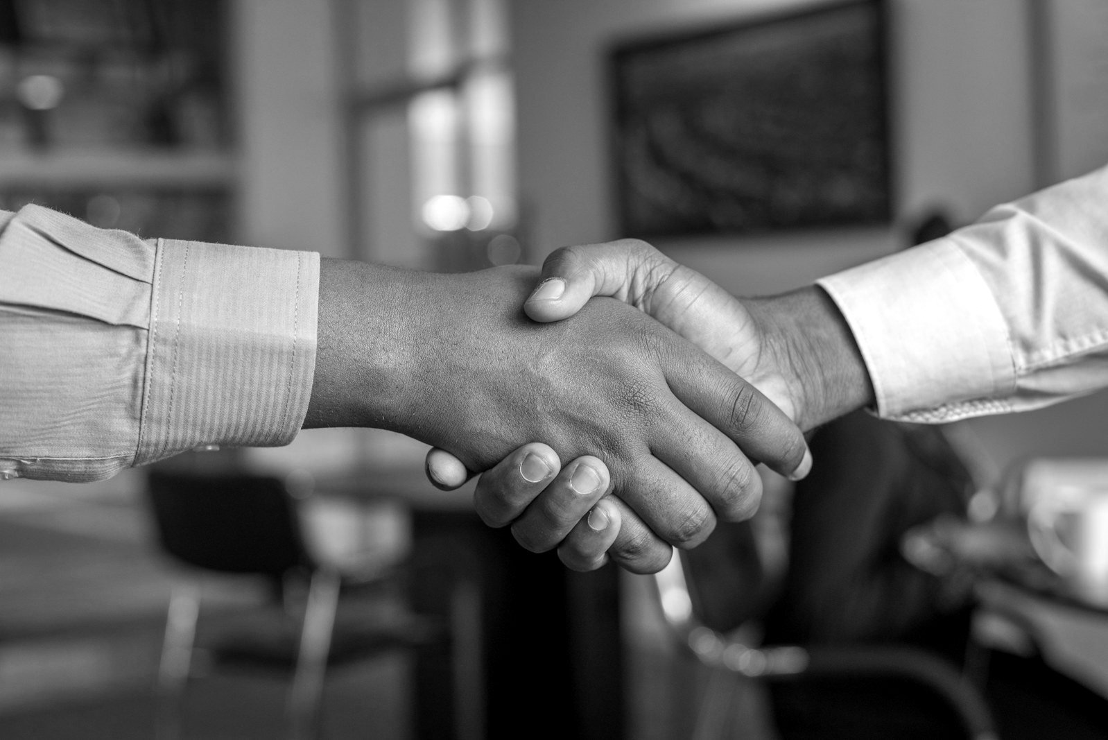 Cheating case in Bangladesh — business people shaking hands over a contract that later fails