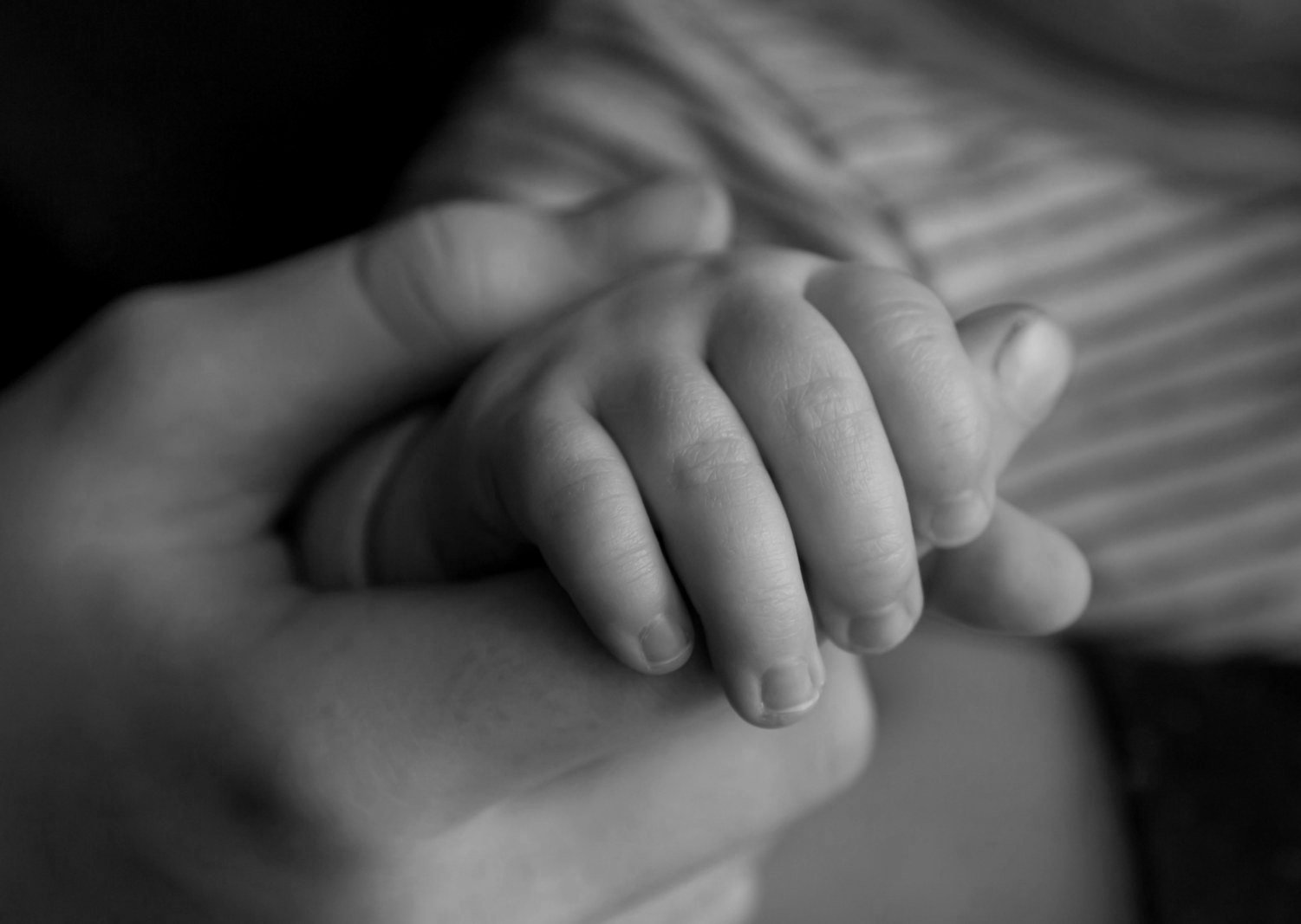 Child custody law in Bangladesh — parent holding a young child's hand on a walk