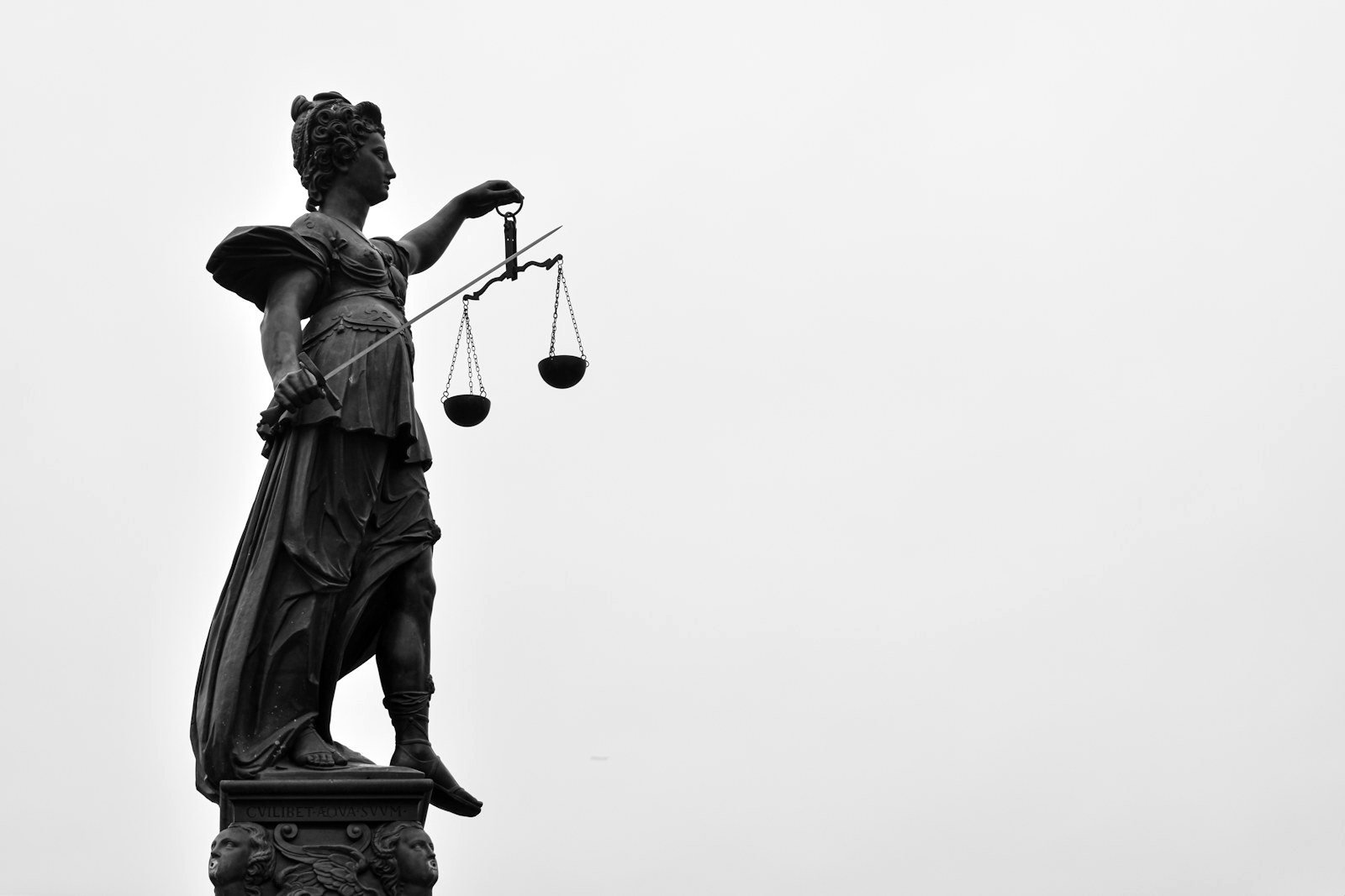 Compensation in writ petition cases — scales of justice representing constitutional tort