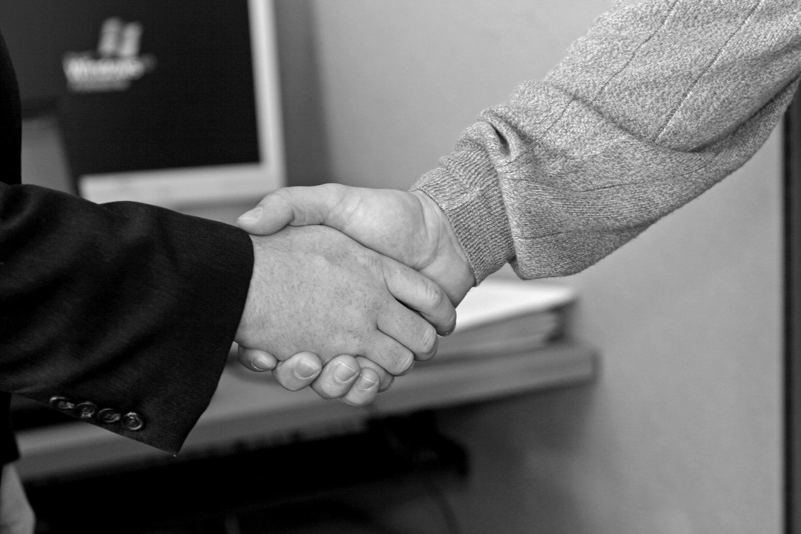 Contract enforcement Bangladesh — business people reviewing a signed commercial contract