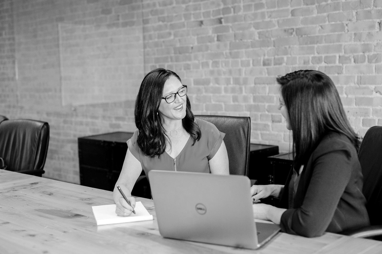 Criminal defence lawyer Bangladesh — advocate meeting a client to review case papers