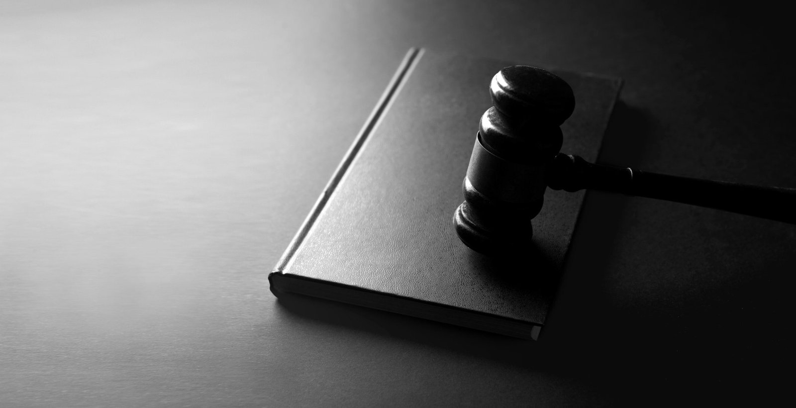 Criminal offences and penalties Bangladesh — statute books and gavel on a judge's bench