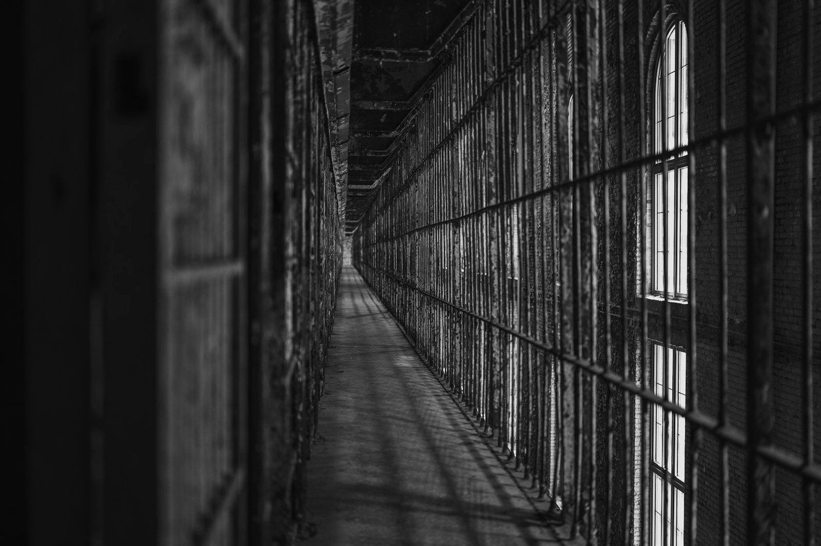 Custodial death compensation in Bangladesh — prison corridor and cell bars