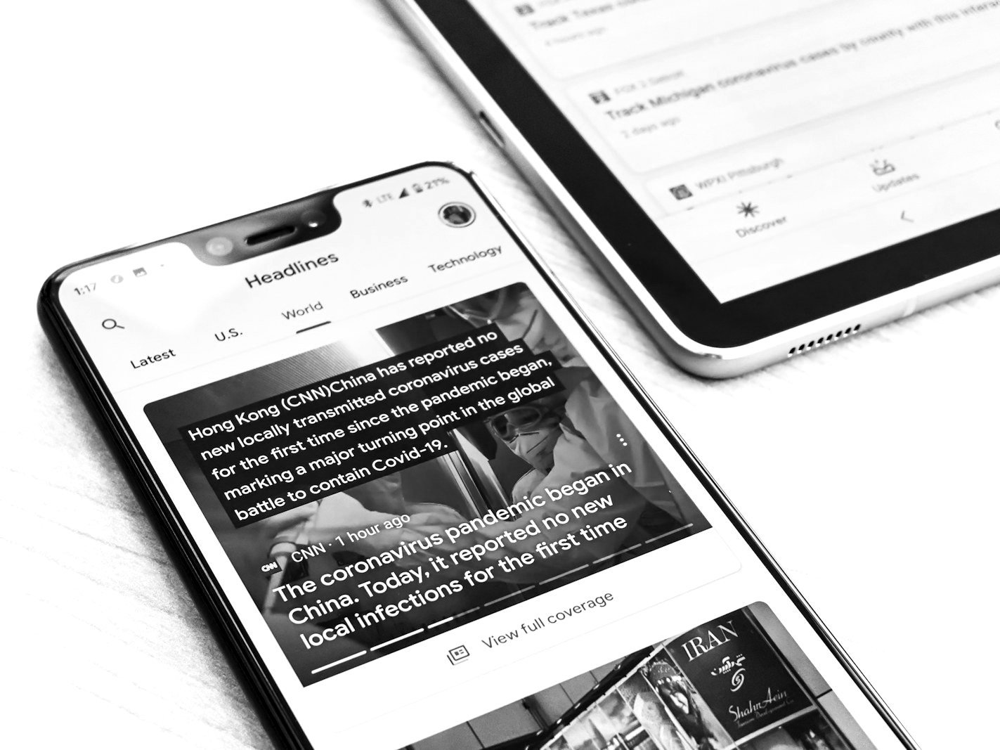 Defamation law Bangladesh — newspaper pages and a smartphone showing a damaging social media post