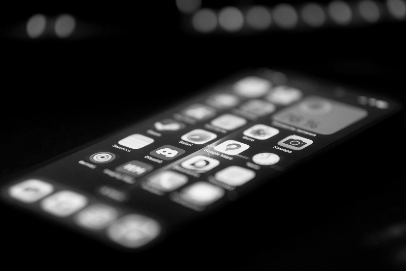 Defamation law Bangladesh — person reading abusive messages on a phone late at night