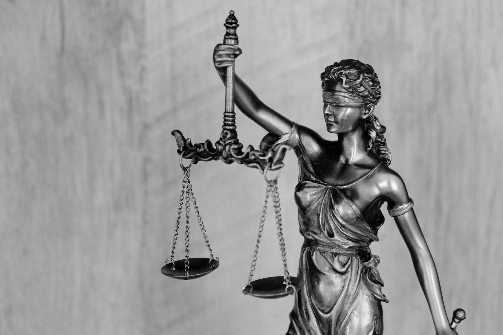 Defend bank suit Bangladesh — borrower and counsel reviewing a bank's plaint and loan statement
