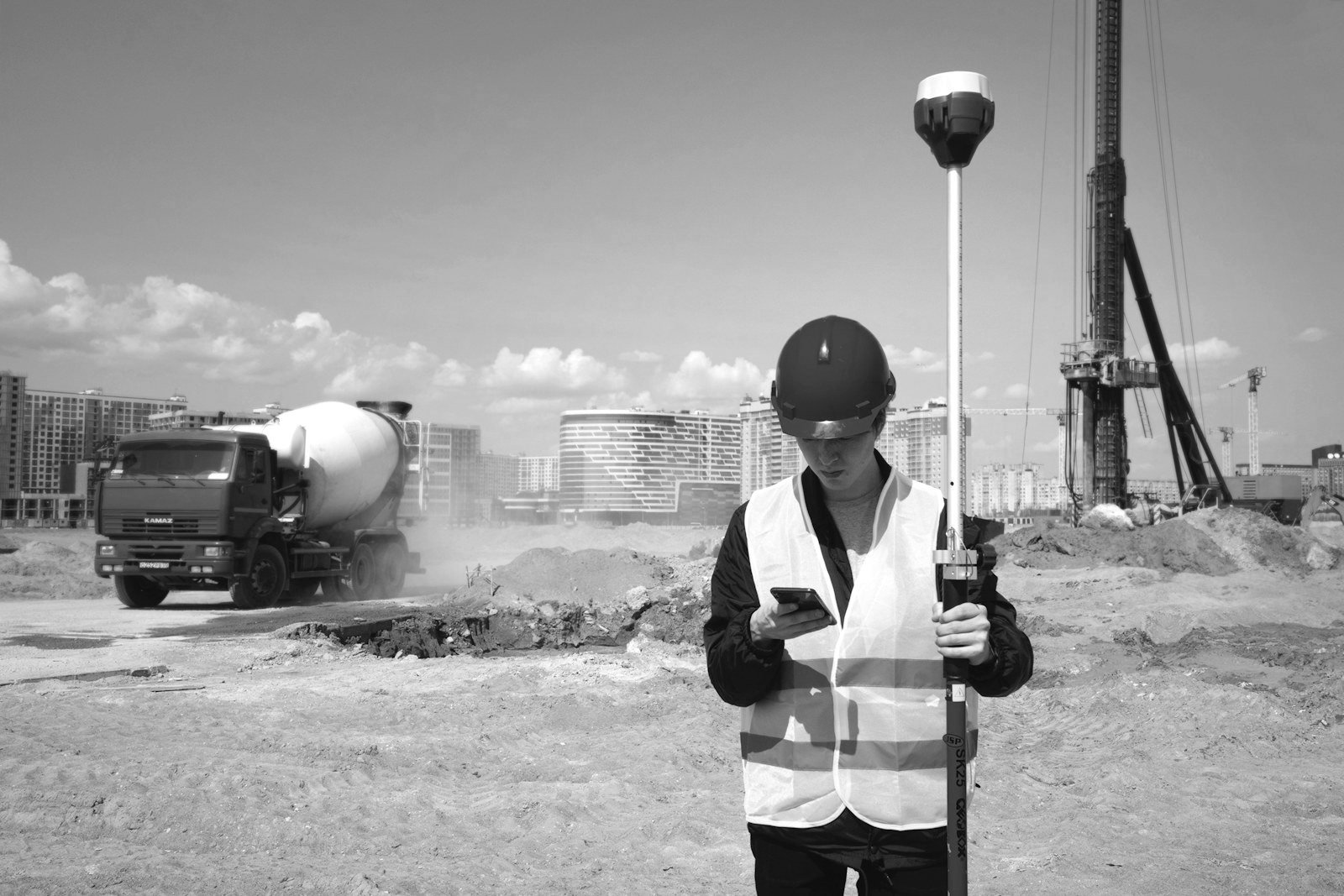 Economic zone lease in Bangladesh — surveyors marking plot boundaries before handover
