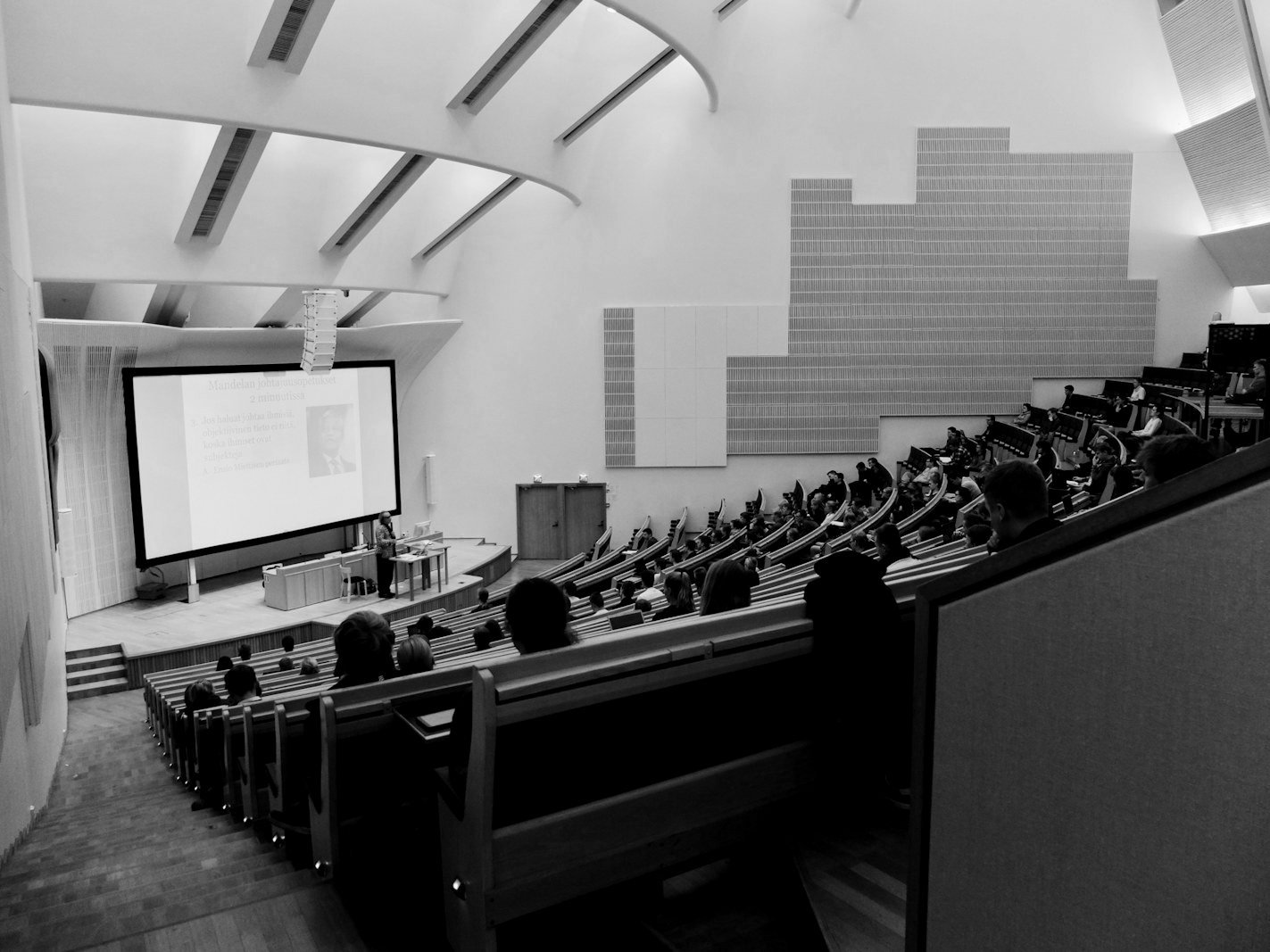 Education admission writ — university campus and lecture hall