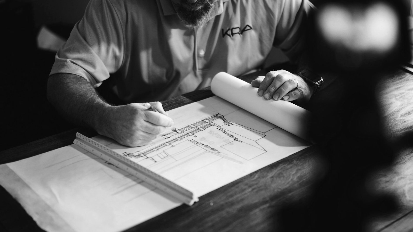 EPC contracts Bangladesh — FIDIC contract documents and drawings on a project office desk