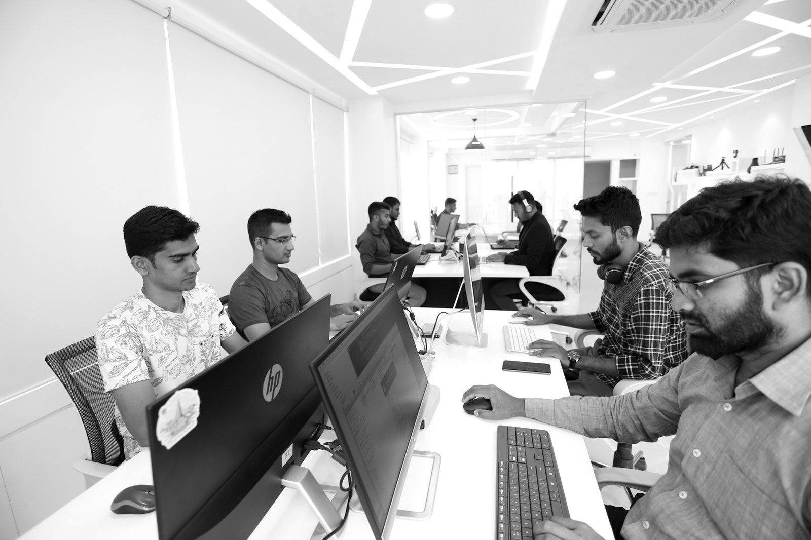 Hiring in Bangladesh — professionals working in a modern Dhaka office
