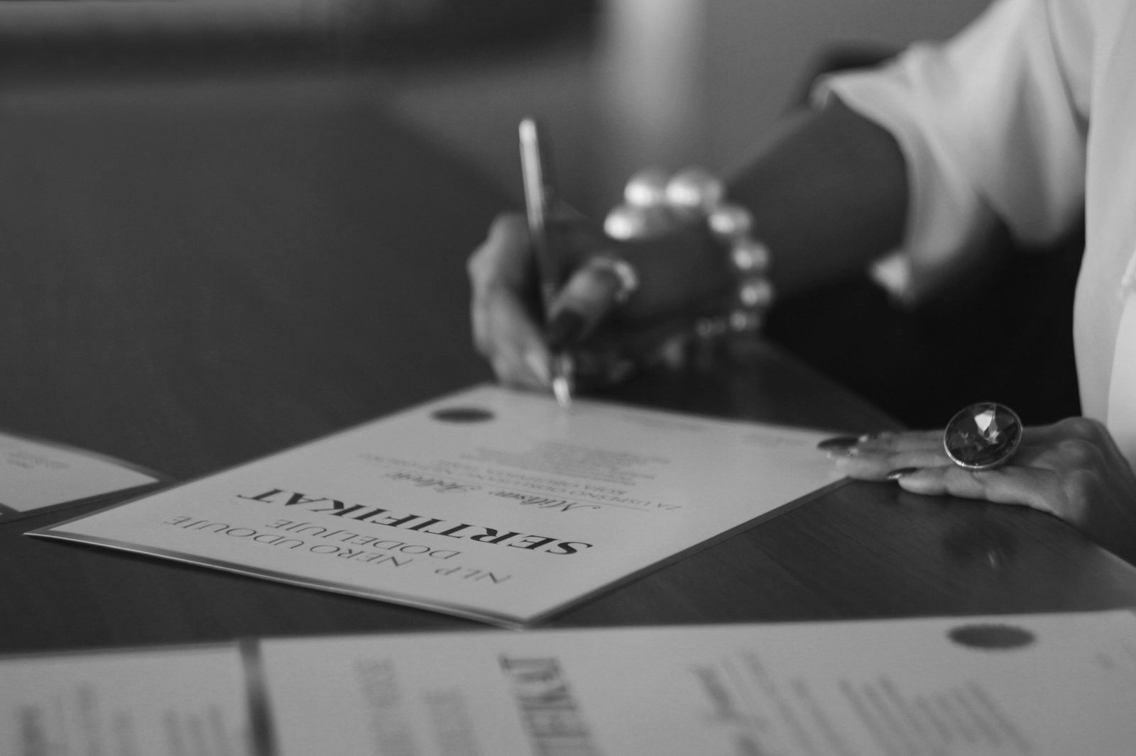 Hiring in Bangladesh — employee reviewing and signing an appointment letter