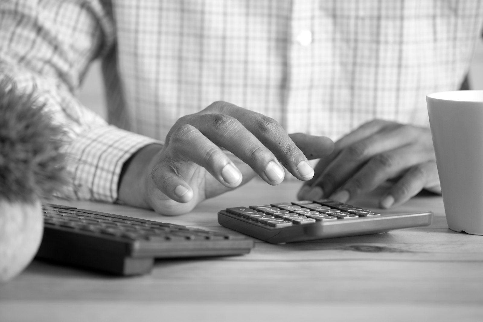 Income Tax Act 2023 Bangladesh — preparing an income tax return with documents and calculator