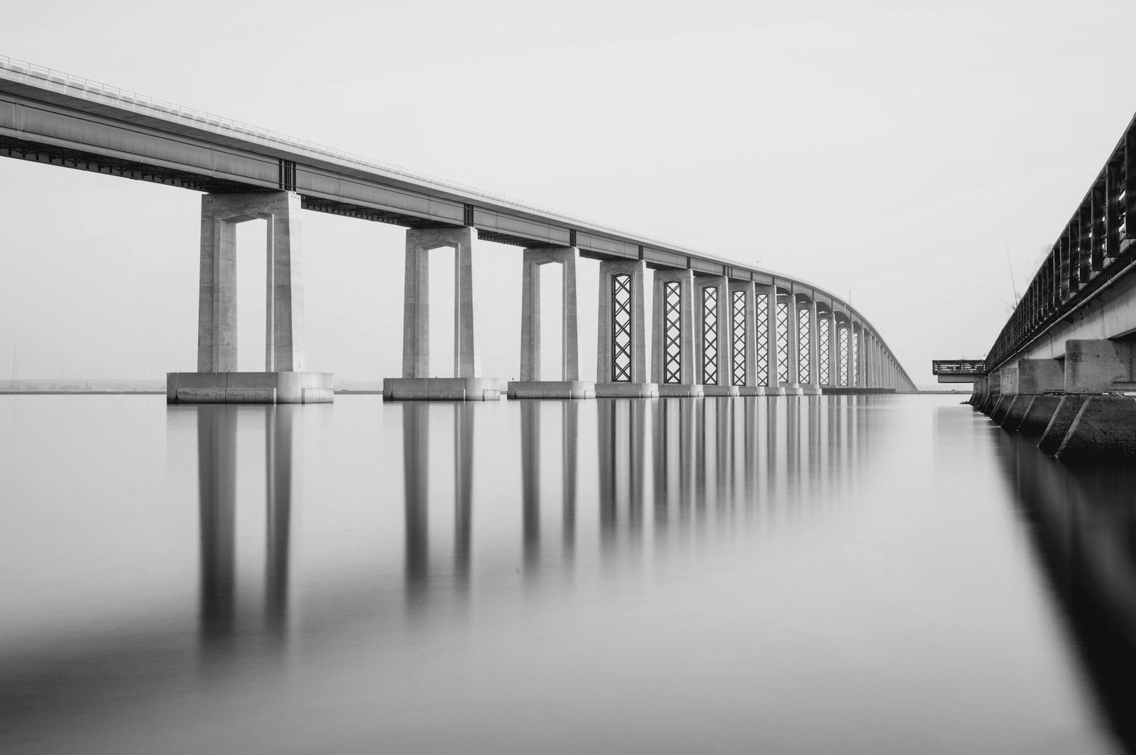Infrastructure projects Bangladesh — large bridge under construction across a river