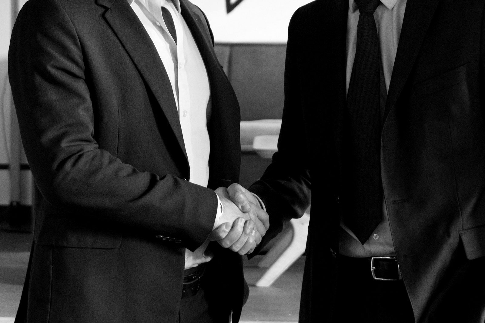 Joint venture Bangladesh — foreign and local partners shaking hands after agreeing a partnership