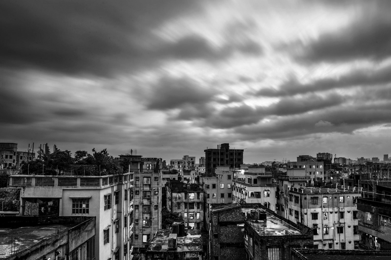 Khas land writ in Bangladesh — apartment buildings on long-term leasehold land in Dhaka