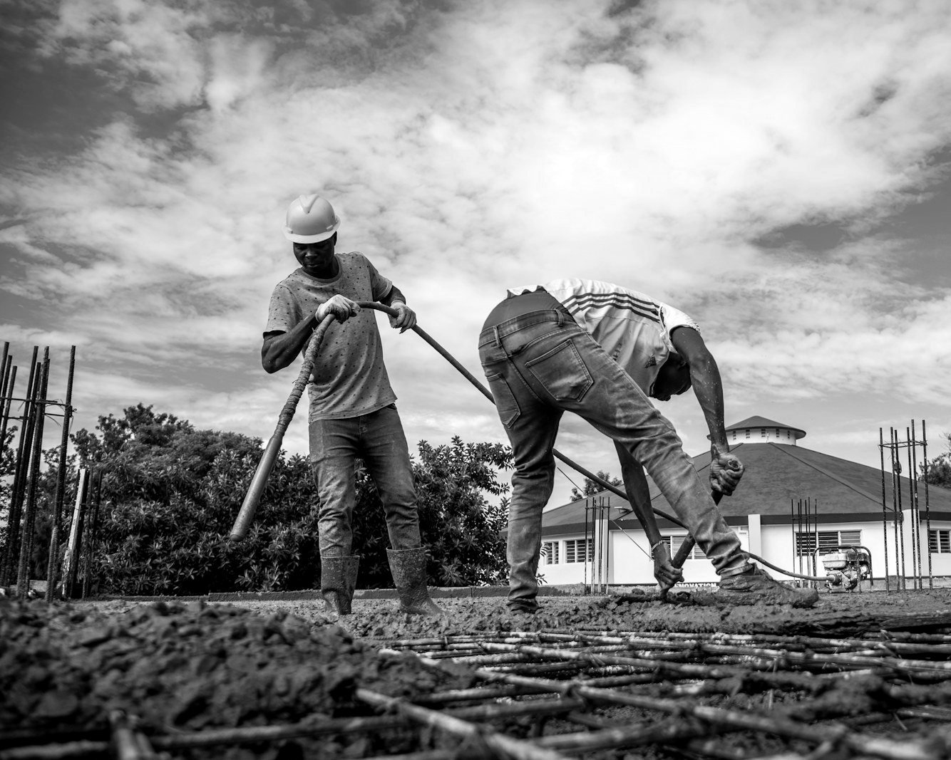 Land grabbing case Bangladesh — lawyer reviewing khatian, deed and tax receipts before filing