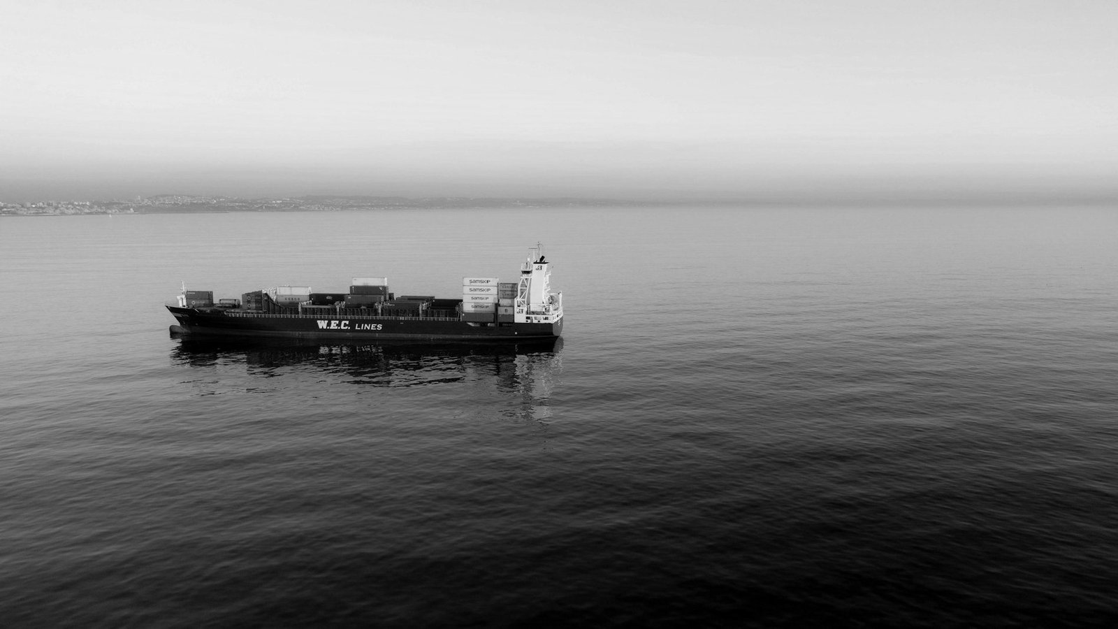 Maritime law in Bangladesh — container ship berthed at a busy port with gantry cranes