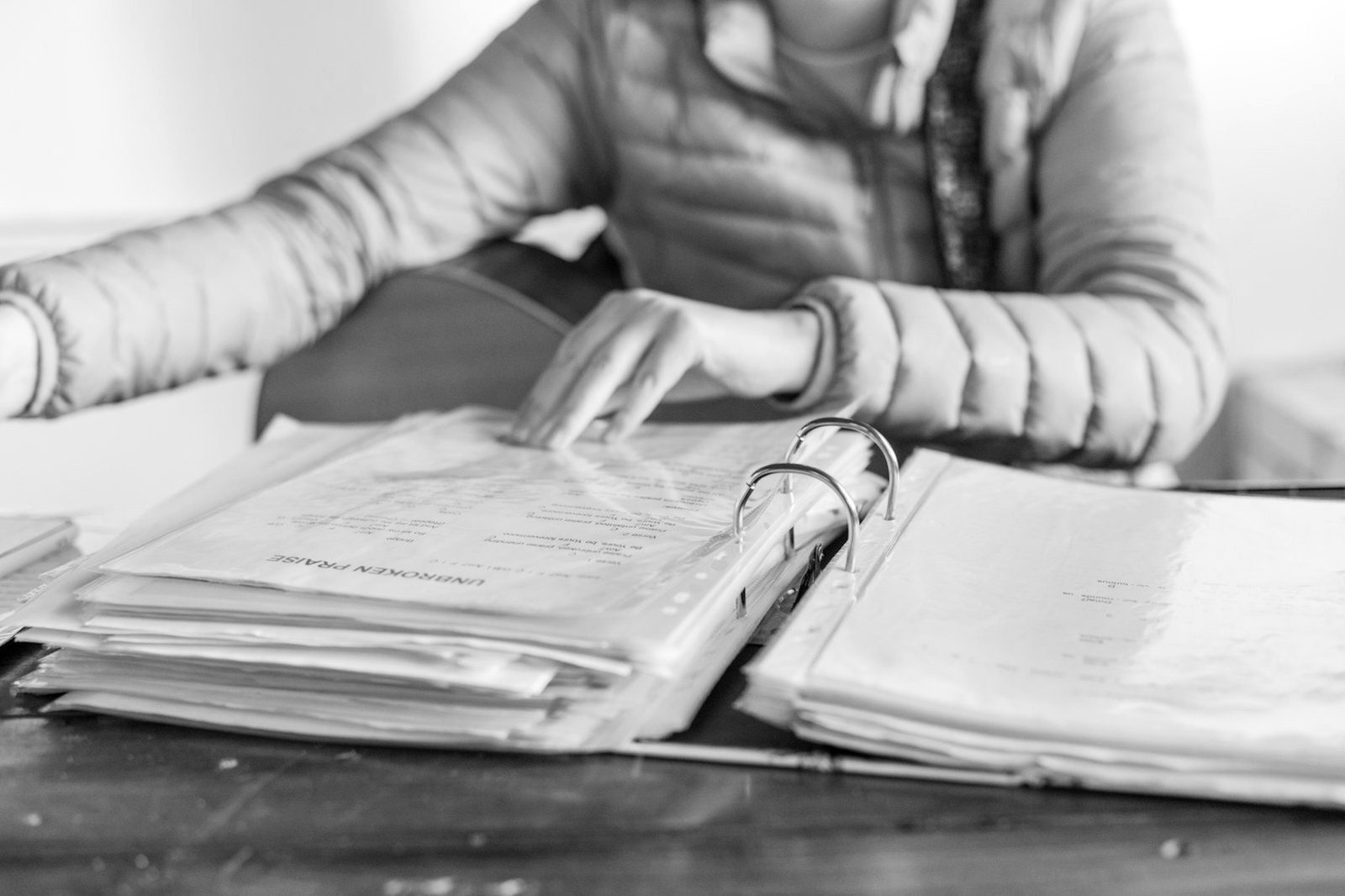 NGO due diligence in Bangladesh — auditor checking vouchers and annual reports