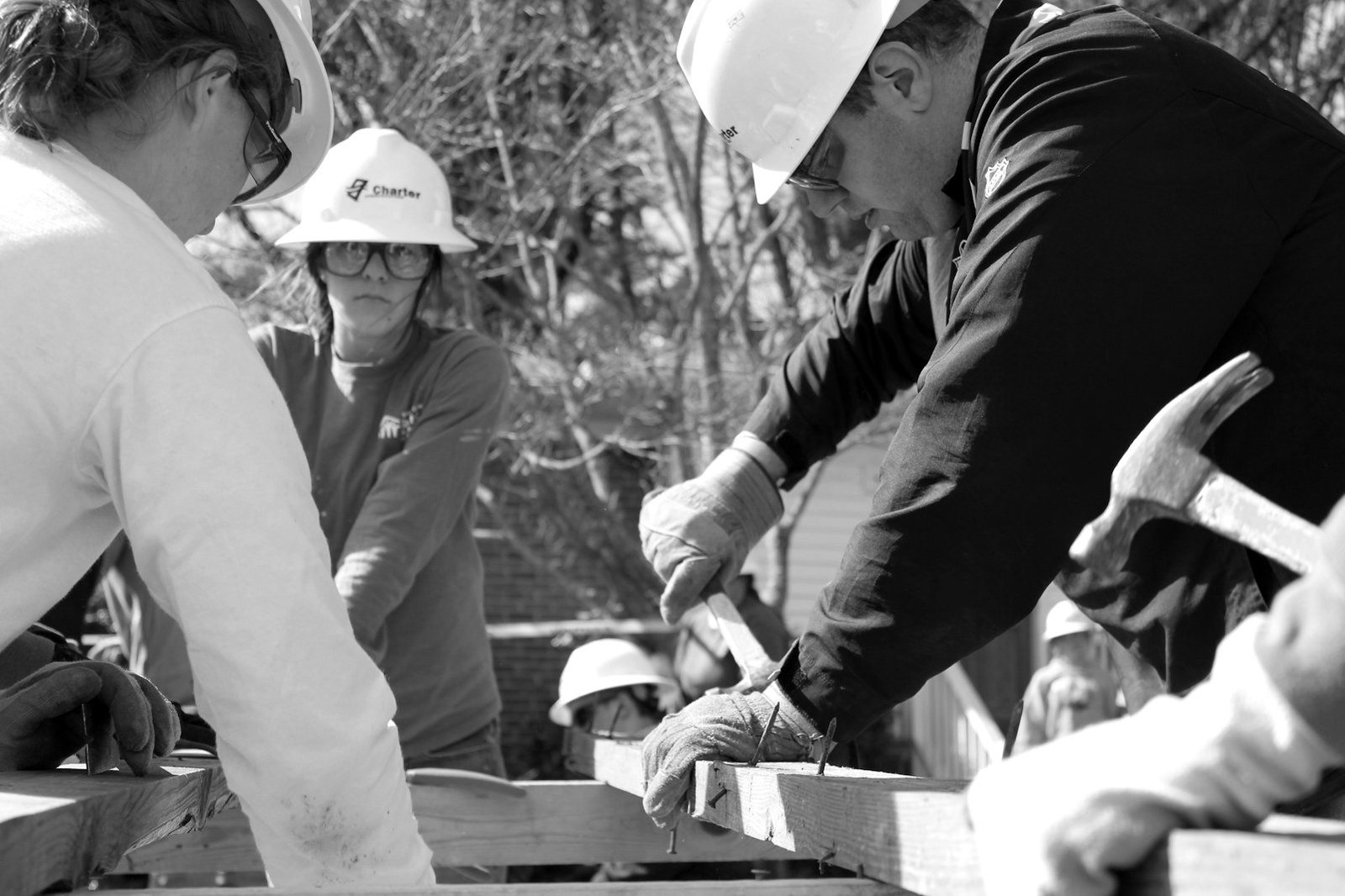 NGO registration cancellation writ — community development workers at a field project