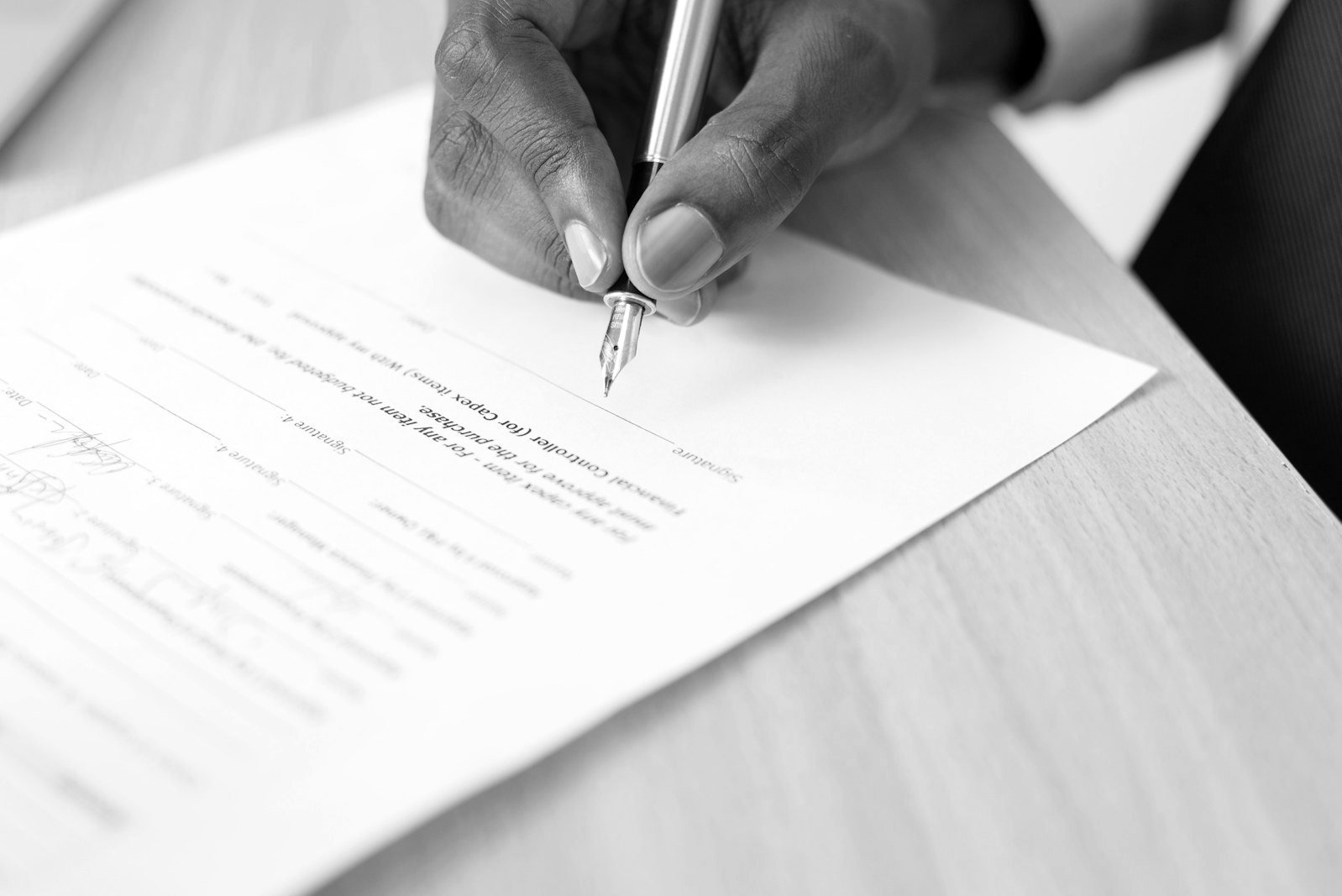 Notice of arbitration Bangladesh — lawyer reviewing a commercial contract before serving notice