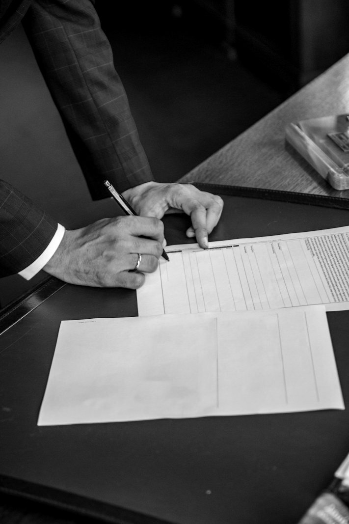 Notice of arbitration Bangladesh — signing a formal notice in a Dhaka office