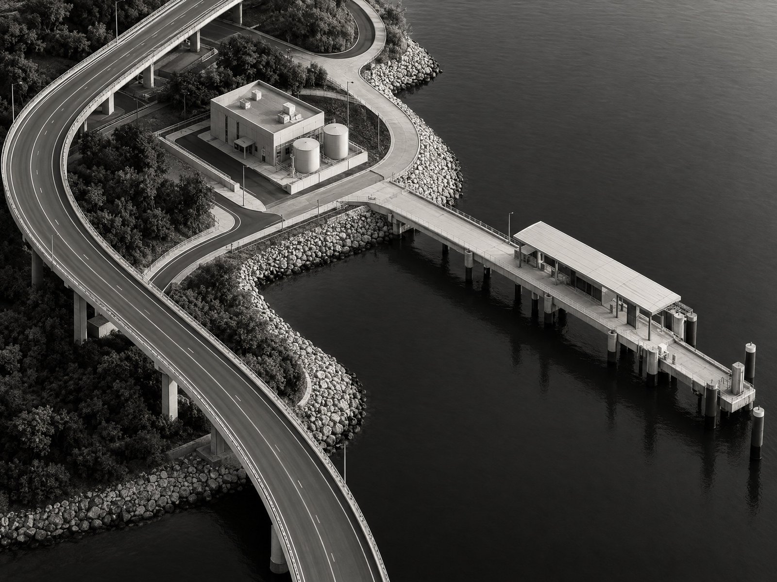 Monochrome conceptual aerial view of interconnected public infrastructure services.