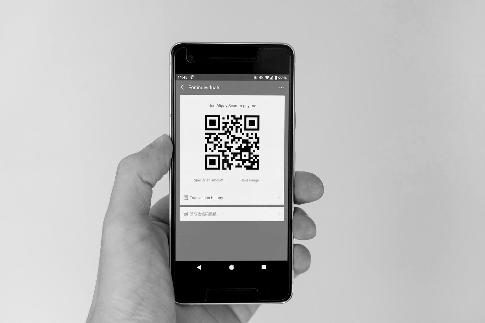 PSO PSP license Bangladesh — customer paying with a mobile wallet at a merchant counter