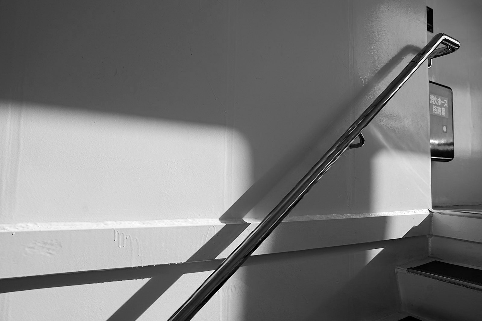 RAJUK building approval — fire safety equipment in a multi-storey building stairwell