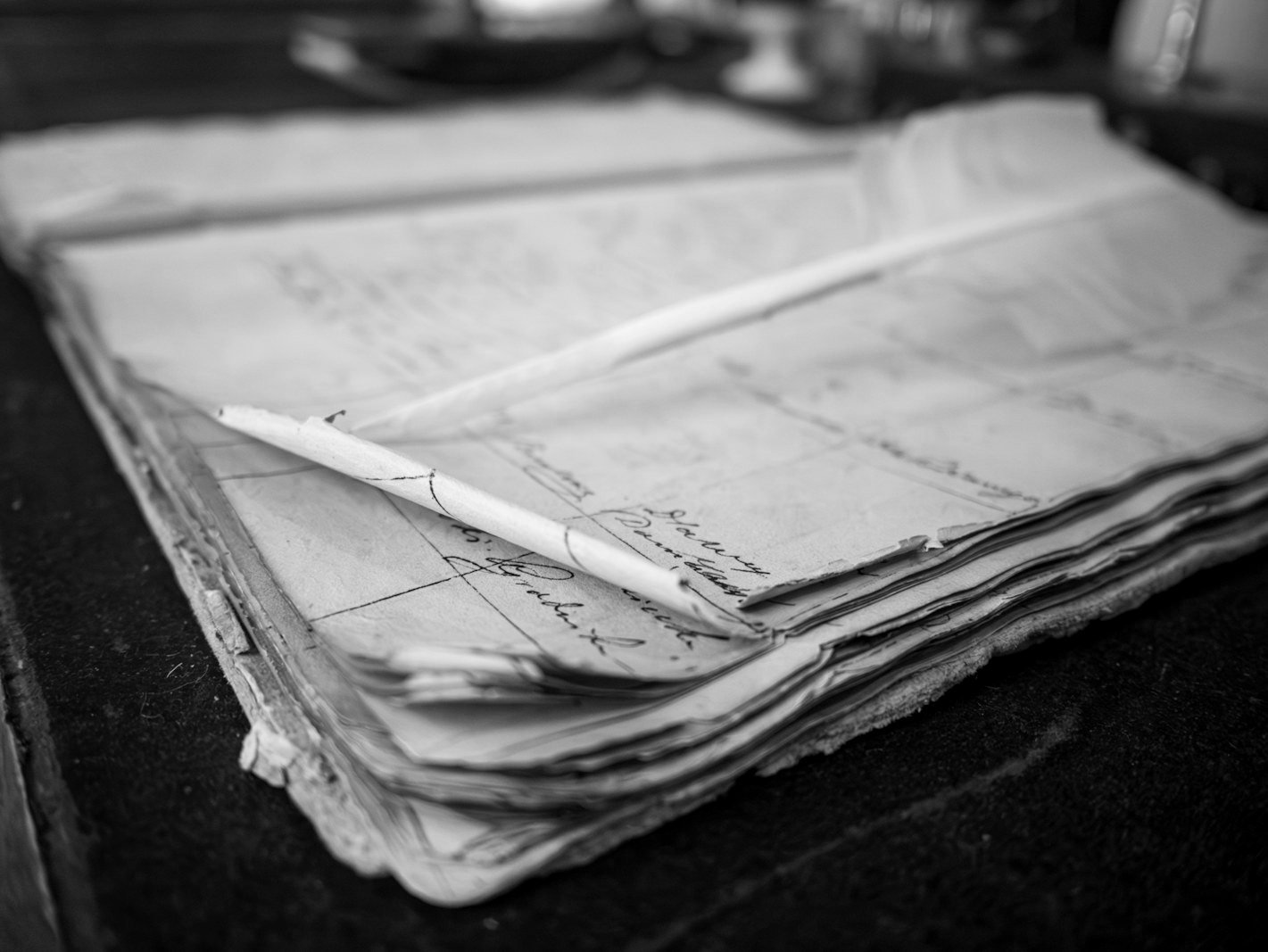 Recovery of possession Bangladesh — title deeds and land records spread on a desk
