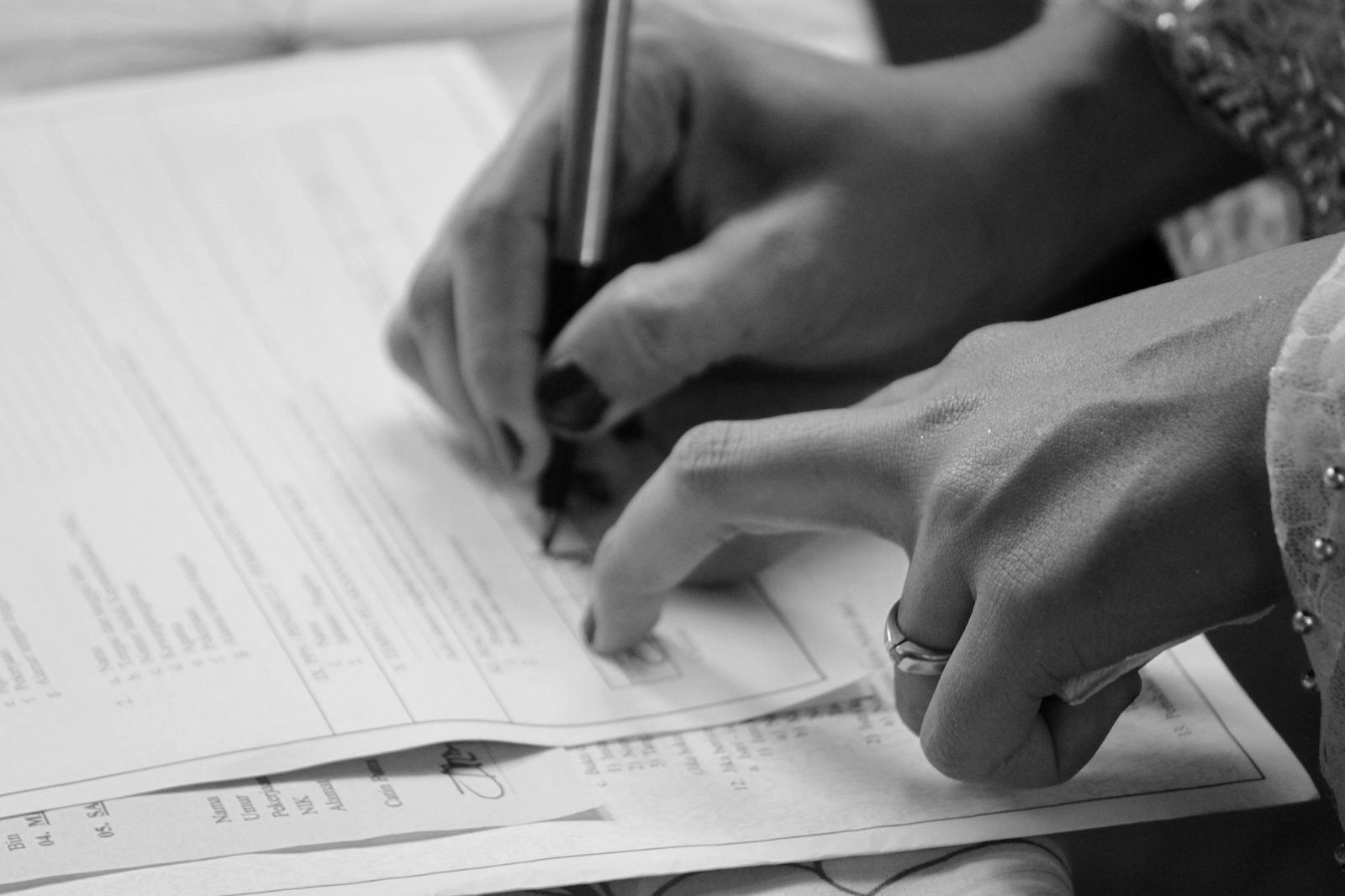 Secured transactions Bangladesh — lender and borrower reviewing a security agreement over movable collateral