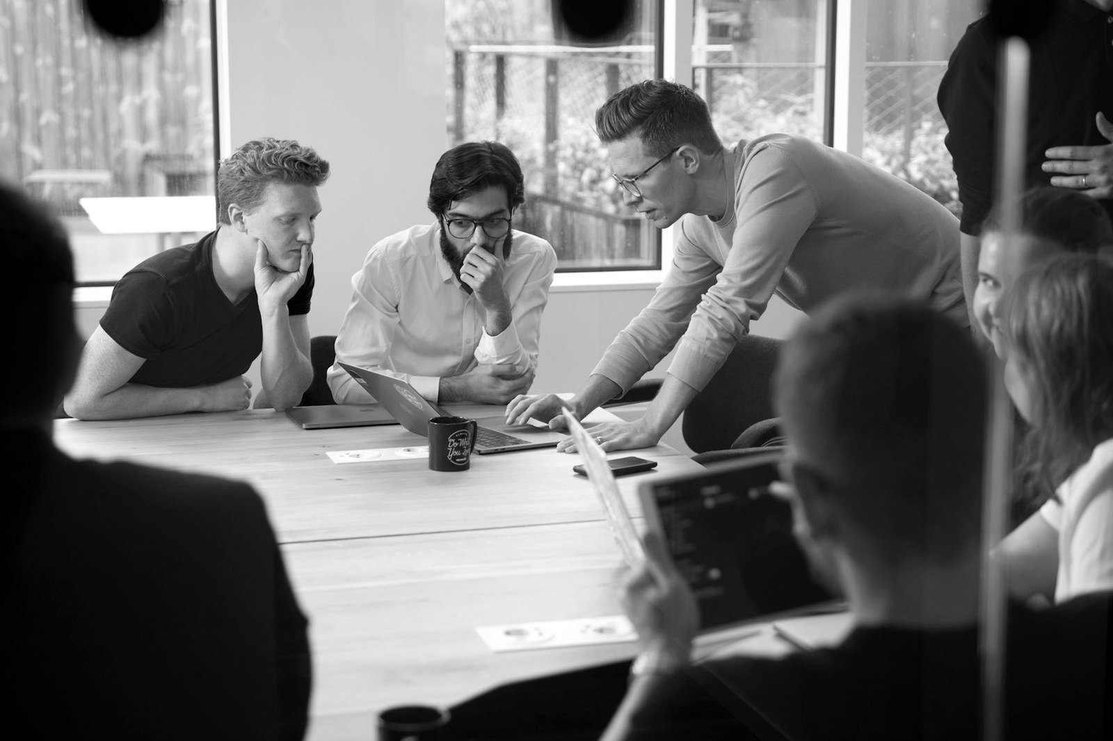 Severance pay Bangladesh — employer and worker reviewing a dismissal decision and compensation