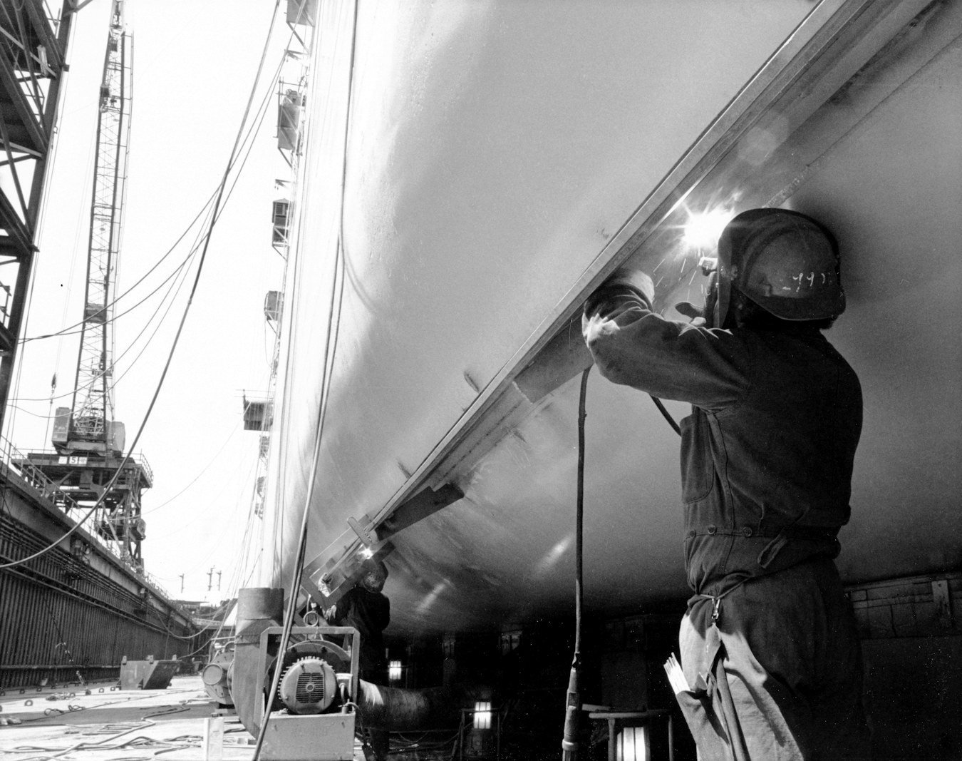 Shipbuilding and ship breaking business Bangladesh — cutting steel plates in a ship recycling yard under Hong Kong Convention rules