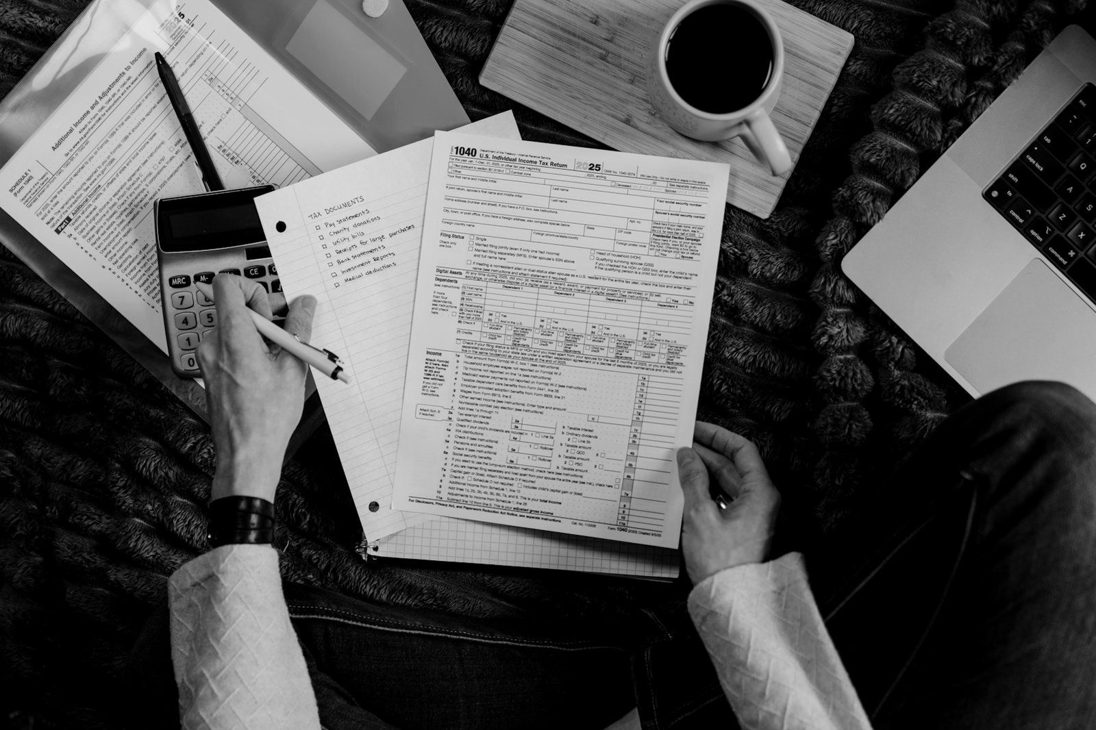 Tax compliance checklist Bangladesh — finance director reviewing the corporate tax calendar for FY2026-27