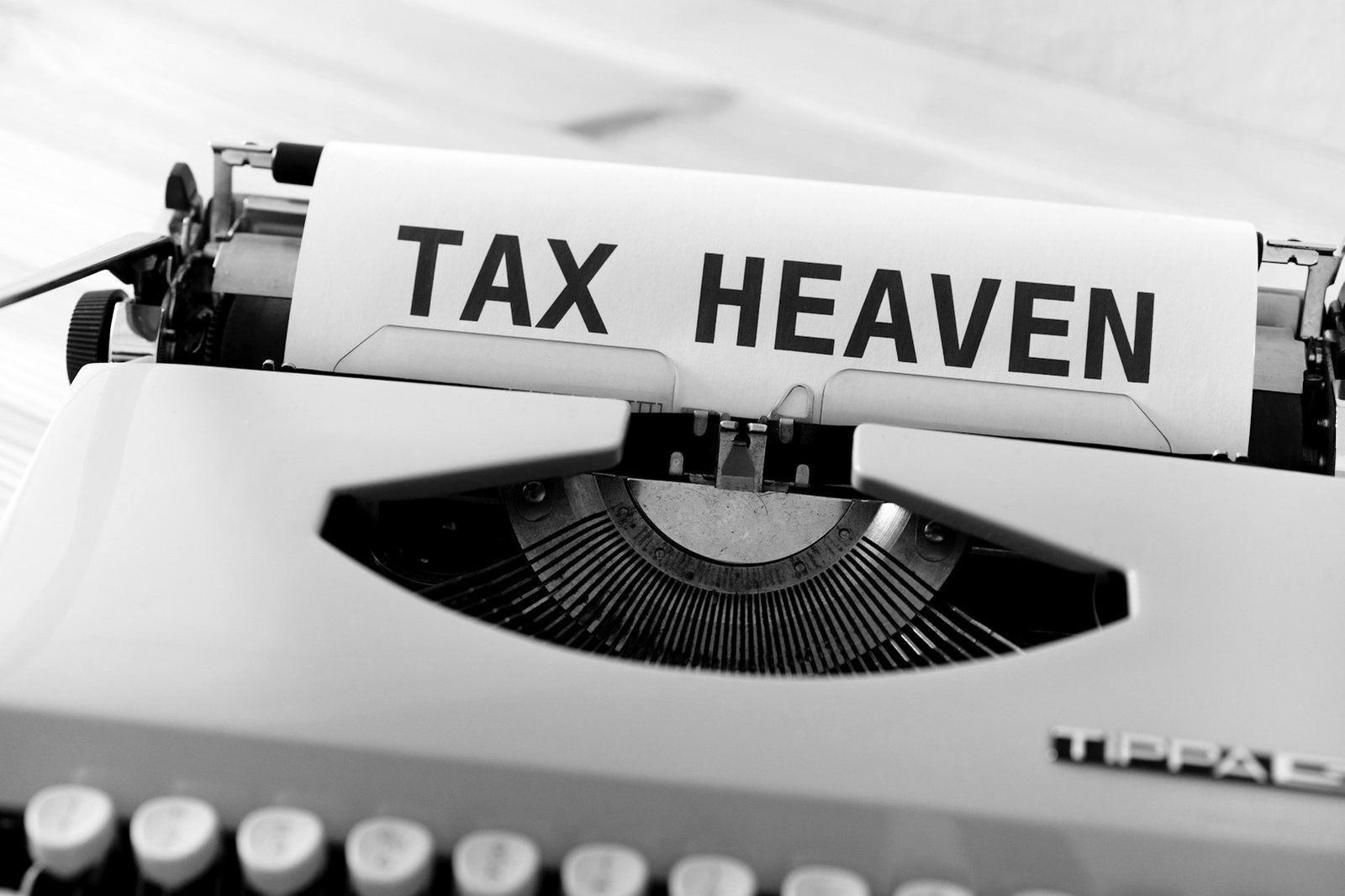 Tax exemptions in Bangladesh — accountant reviewing an income tax return and exempt income schedule