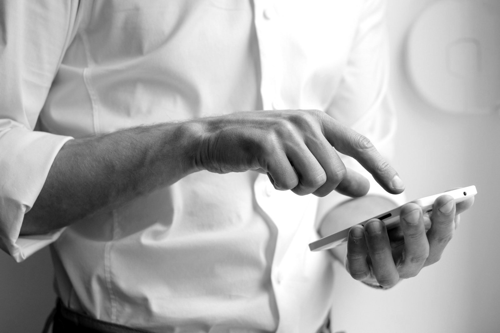 Telecommunications law Bangladesh — smartphone user relying on uninterrupted internet access