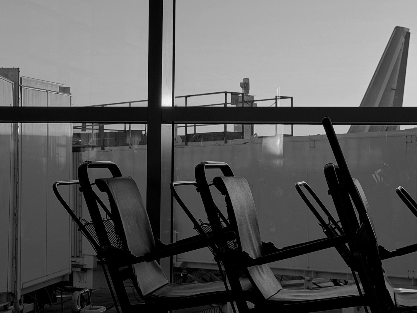 Travel ban in Bangladesh — traveller at an airport departure gate before immigration