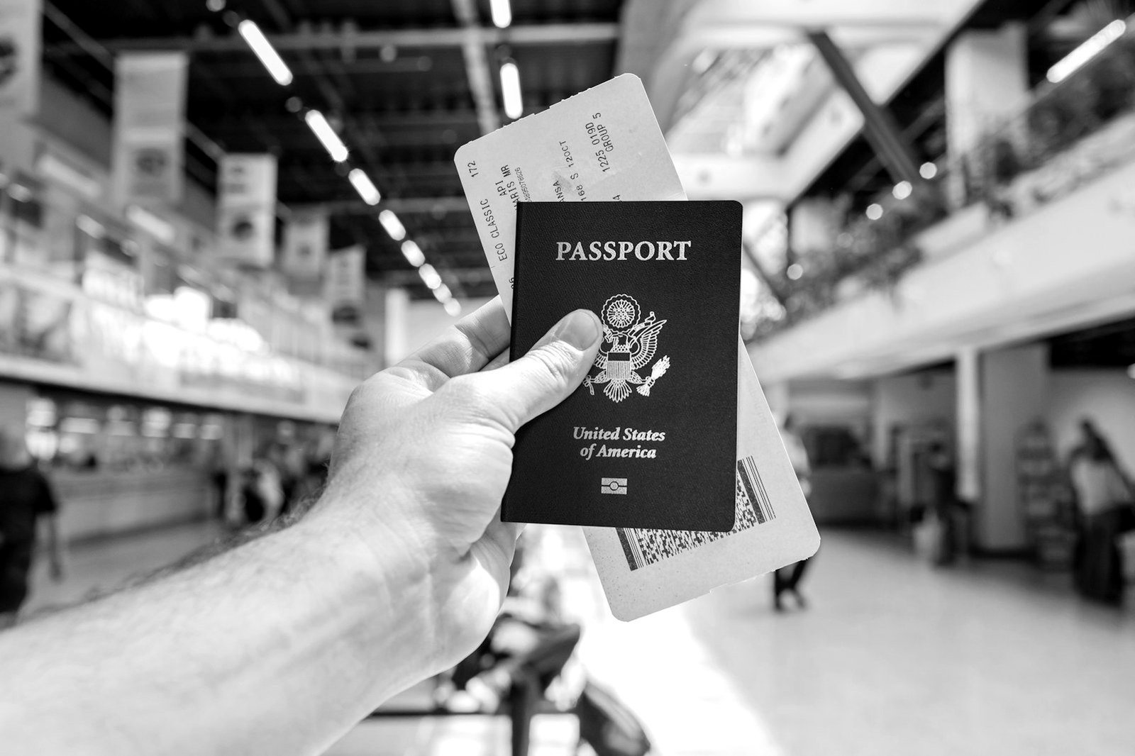 Travel ban in Bangladesh — passport and travel documents examined by an officer