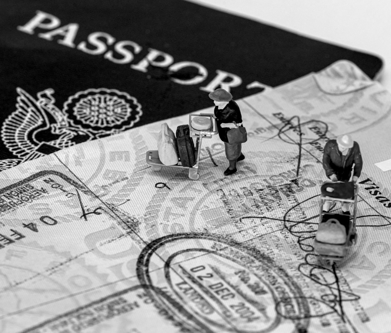 US green card from Bangladesh — airport departure board for travellers leaving to settle in the United States