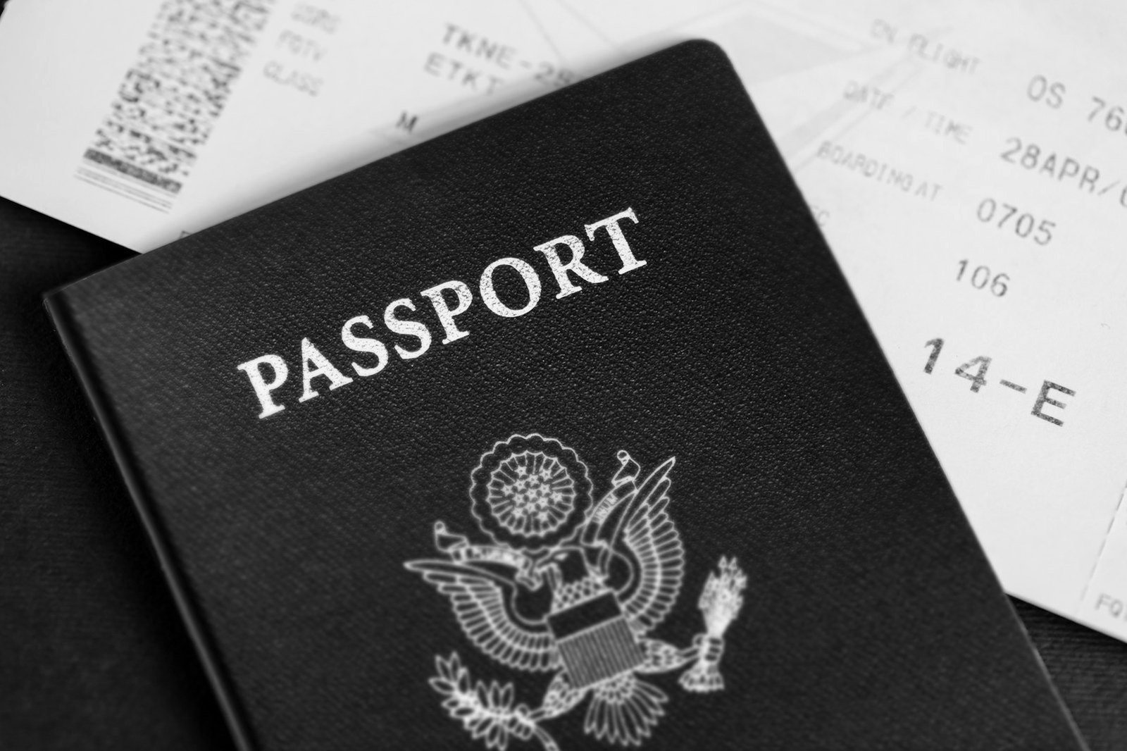 US immigration forms and fees — family petition documents and passports on a table