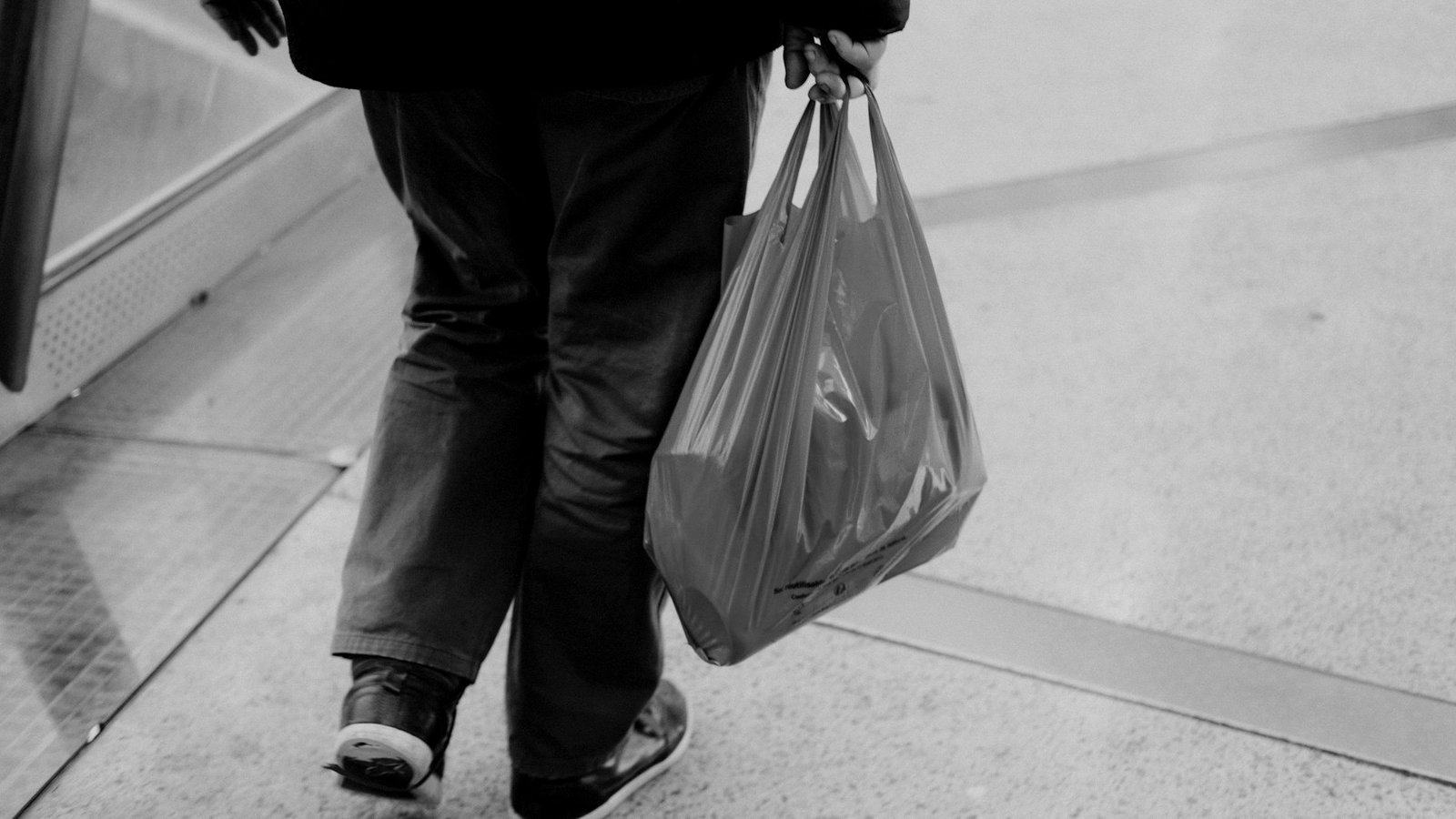 Waste management law Bangladesh — plastic bags and single-use packaging at a market