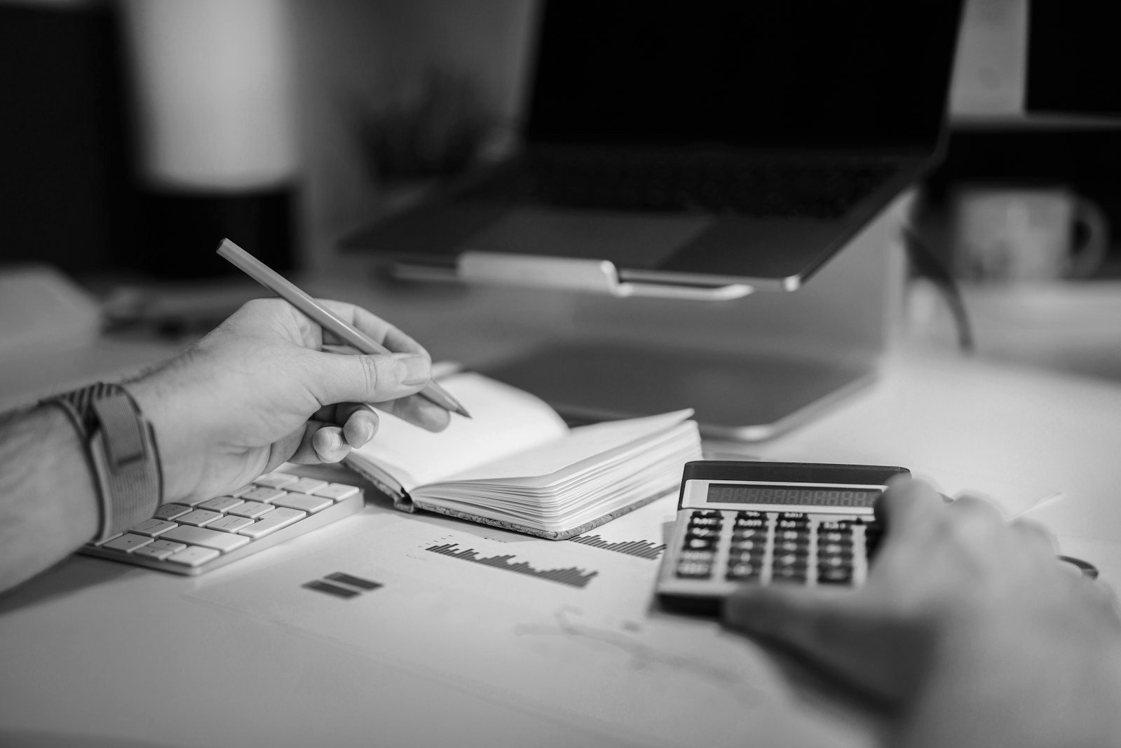 Wilful defaulter in Bangladesh — borrower reviewing financial statements to answer a bank notice