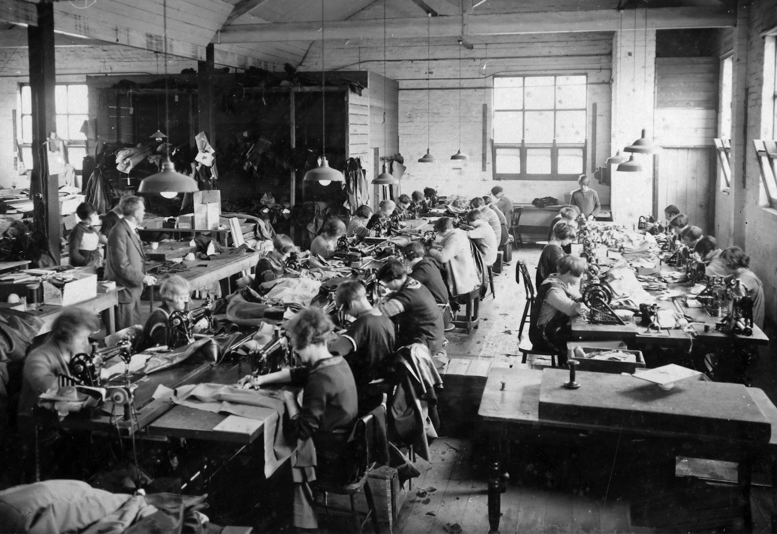 Workers rights in Bangladesh — garment factory workers at sewing machines on a production floor