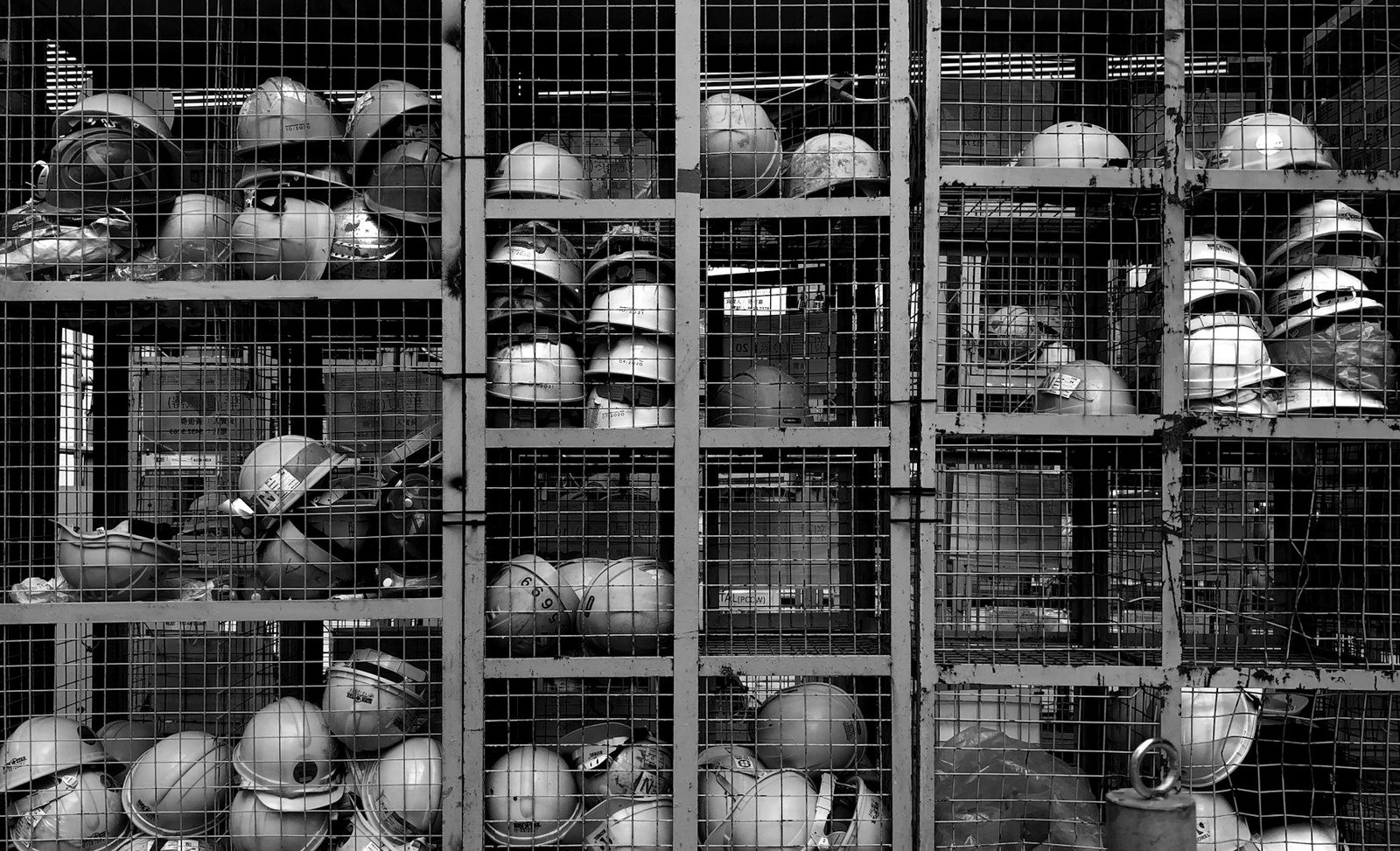 Workplace harassment law Bangladesh — safety helmet and protective equipment on a construction site